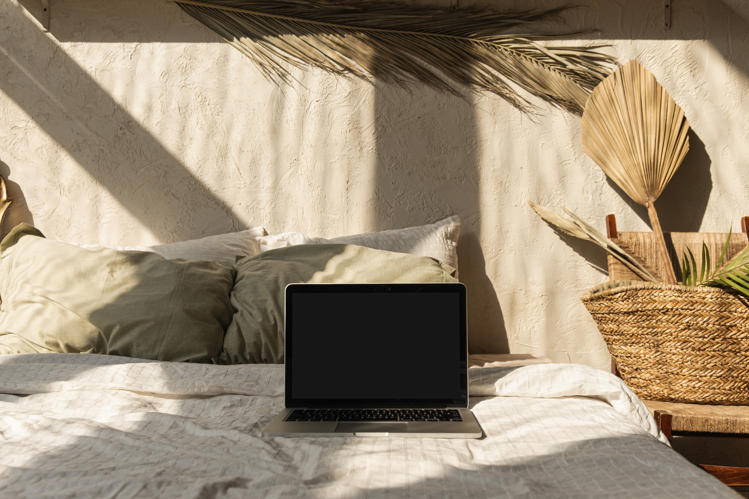 Laptop on Bed with Rustic Home Decor
